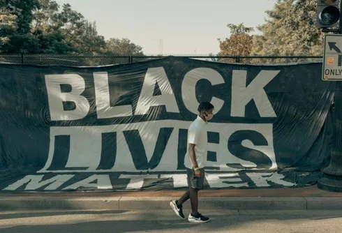 Black Lives Matter banner on a fence